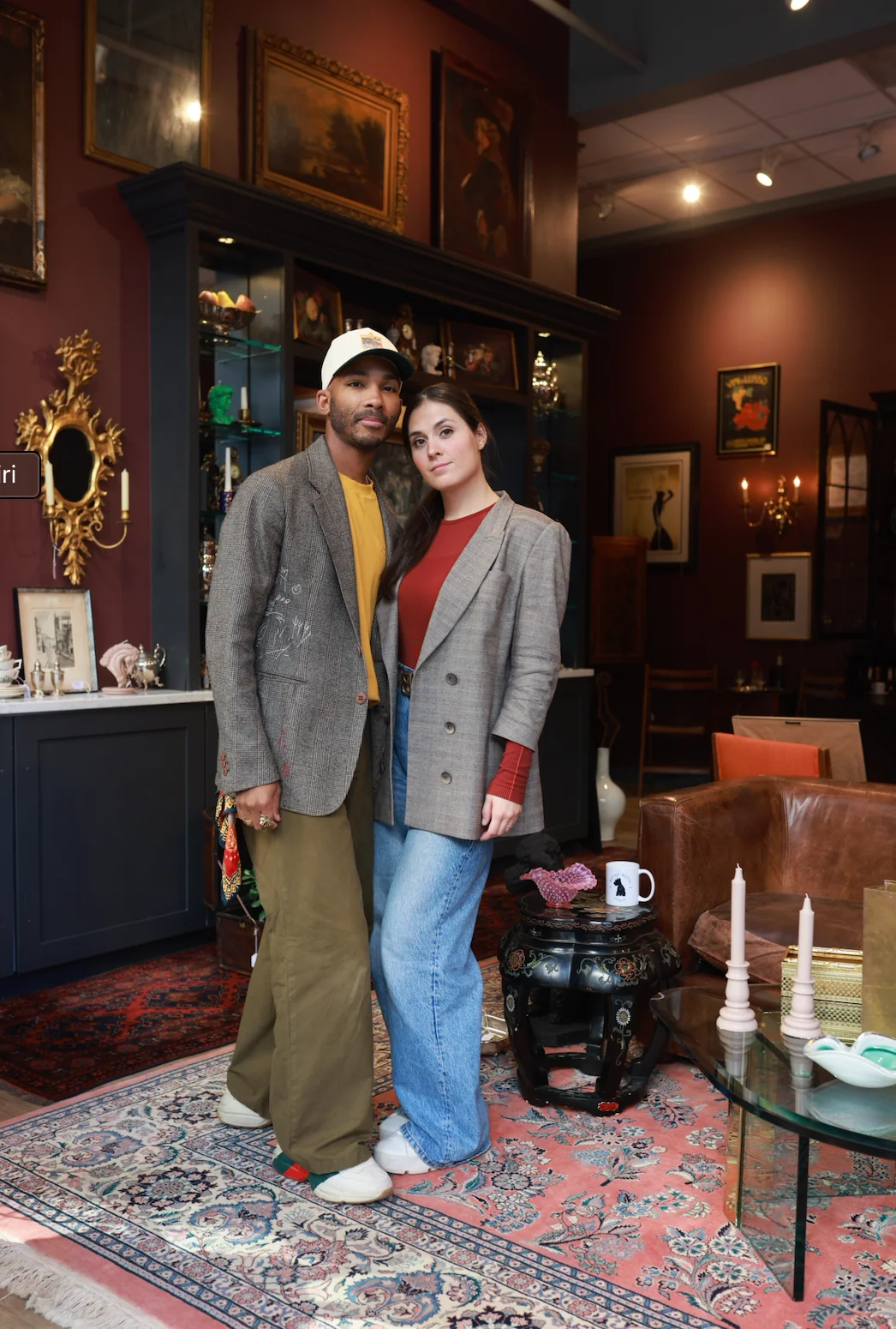 A curated interior featuring European antiques and collectible objects at Mount Royal Studios
